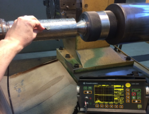 Ultrasonic inspection UT of machined shaft with instrument